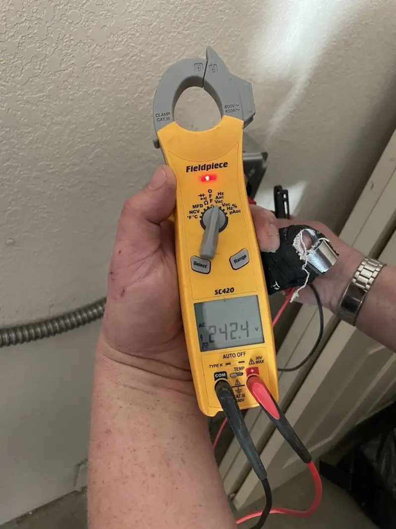 Voltage testing with clamp meter during Outlet Installation in East Stroudsburg